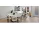 Bright living room featuring a neutral color palette, modern furnishings, and large windows at 1815 N Williams St, Denver, CO 80218