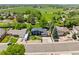 Aerial view of home showcasing the mature trees, lawn, and proximity to the greenbelt at 7325 Taft Ct, Arvada, CO 80005