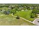 Beautiful aerial view of community park with walking paths, picnic area and mature trees at 7325 Taft Ct, Arvada, CO 80005