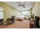 Cozy bedroom with ceiling fan and closet, perfect for relaxation at 13324 W 86Th Dr, Arvada, CO 80005