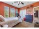 Bedroom with natural light, large windows, and closet space offers a comfortable and inviting retreat at 13324 W 86Th Dr, Arvada, CO 80005