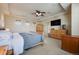 The primary bedroom features neutral colors, lots of natural lighting, and plenty of space for furniture at 13324 W 86Th Dr, Arvada, CO 80005