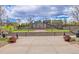 Scenic community space with tiered steps leading to a grassy area and gazebo, perfect for gatherings at 13324 W 86Th Dr, Arvada, CO 80005