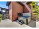 Backyard patio with hot tub and outdoor television at 13324 W 86Th Dr, Arvada, CO 80005