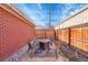 Outdoor patio area with a fire pit and seating at 4501 Bryant St, Denver, CO 80211