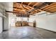 An empty garage with workbench and lots of natural light at 8408 W 62Nd Pl, Arvada, CO 80004