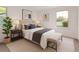 Cozy bedroom with a neutral color palette, stylish furnishings, and ample natural light at 2345 Akron St, Denver, CO 80238