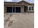 Attached garage with newer windowed garage door at 15217 Xenia, Thornton, CO 80602