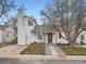 Beautiful home with a walkway, chimney and a mature tree in the front yard at 2310 Willow Creek Dr, Golden, CO 80401