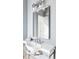 Stylish bathroom with a metal framed mirror, and industrial style sink at 1 Sedgwick Dr, Cherry Hills Village, CO 80113