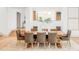 Dining area with hardwood floors, a rustic table, and comfortable seating at 1 Sedgwick Dr, Cherry Hills Village, CO 80113