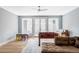 Recreation room with a foosball table, game table, piano, and cozy couch at 1 Sedgwick Dr, Cherry Hills Village, CO 80113