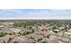 Aerial view showcasing apartment buildings, surrounding neighborhood, and local businesses at 14351 E Tennessee Ave # 305, Aurora, CO 80012