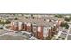 An aerial view of the apartment building, showing its size and layout from above at 14351 E Tennessee Ave # 305, Aurora, CO 80012