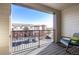 Private balcony overlooking the parking lot at 14351 E Tennessee Ave # 305, Aurora, CO 80012