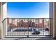 Balcony view of the apartment building and parking lot at 14351 E Tennessee Ave # 305, Aurora, CO 80012