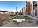 Courtyard with grassy area and seating at 14351 E Tennessee Ave # 305, Aurora, CO 80012