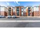 Exterior of the apartment building with parking at 14351 E Tennessee Ave # 305, Aurora, CO 80012