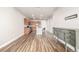 Open concept kitchen with island and stainless steel appliances at 14351 E Tennessee Ave # 305, Aurora, CO 80012