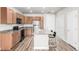 Modern kitchen with stainless steel appliances and an island at 14351 E Tennessee Ave # 305, Aurora, CO 80012