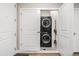 Convenient laundry closet with stacked washer and dryer at 14351 E Tennessee Ave # 305, Aurora, CO 80012