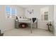 Bedroom with a gray loft bed and hockey themed decor at 11103 Cloud Shadow St, Littleton, CO 80125