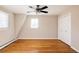 Well-lit bedroom with hardwood floors and double closets at 2355 Cherryville Rd, Greenwood Village, CO 80121