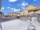 Beautiful backyard featuring a fire pit, stone features and gravel landscaping at 8894 River Peak Cir, Littleton, CO 80125