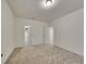 Spacious bedroom boasts carpet flooring and easy access to closet and other rooms at 8894 River Peak Cir, Littleton, CO 80125
