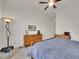 The bedroom features hardwood floors and an area rug at 8894 River Peak Cir, Littleton, CO 80125