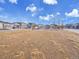 Expansive community park with a large grassy field, picnic area and inviting benches for residents to enjoy at 8894 River Peak Cir, Littleton, CO 80125
