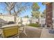 Private backyard features a patio with outdoor seating and a grill at 7925 W Layton Ave # 529, Littleton, CO 80123