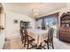 Elegant dining room with large window views and a chandelier at 7925 W Layton Ave # 529, Littleton, CO 80123