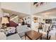Spacious living room with a tall ceiling and a staircase to the upper level at 7925 W Layton Ave # 529, Littleton, CO 80123