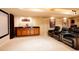Basement home theater with projector, snack bar, and comfortable reclining chairs for the ultimate movie night experience at 5184 Pinyon Jay Rd, Parker, CO 80134