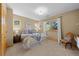 Bedroom with neutral walls and ample natural light from multiple windows at 7737 Taylor Cir, Larkspur, CO 80118