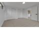 Finished basement with access to the wet bar and featuring sliding door closets at 2961 S Rosemary St, Denver, CO 80231