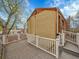 Spacious back deck overlooking the yard provides ample outdoor lounging and entertainment space at 240 Colorado Blvd, Denver, CO 80206