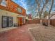 Cozy backyard with a brick patio and gravel area, perfect for outdoor gatherings and relaxing at 240 Colorado Blvd, Denver, CO 80206