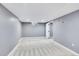Finished basement area featuring neutral walls, plush carpeting, with easy room access at 240 Colorado Blvd, Denver, CO 80206