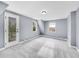 Bright room with neutral paint, carpeted floors, and a private outdoor balcony at 240 Colorado Blvd, Denver, CO 80206
