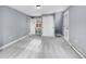 This bedroom features neutral walls, plush carpeting, with closet and outdoor access at 240 Colorado Blvd, Denver, CO 80206