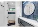 Modern bathroom featuring sleek vanity, stylish tiling, and contemporary fixtures for a luxurious feel at 202 October Pl, Castle Rock, CO 80104