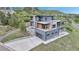 Contemporary home on a hillside, featuring a modern design with natural surroundings at 202 October Pl, Castle Rock, CO 80104