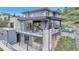 Modern home with multiple decks, stone accents, and contemporary design at 202 October Pl, Castle Rock, CO 80104