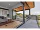 Spacious patio with mountain views, comfortable seating and a smooth transition into the home's living area at 202 October Pl, Castle Rock, CO 80104