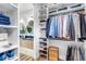 Organized walk-in closet with ample shelving, hanging space, and a view into the modern bathroom at 202 October Pl, Castle Rock, CO 80104