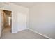 Bedroom with sliding closet doors and carpet at 6942 Huddersfield Ln, Castle Pines, CO 80108