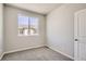 Simple bedroom with carpet and a window at 6942 Huddersfield Ln, Castle Pines, CO 80108