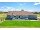 Expansive backyard with a concrete patio perfect for outdoor dining and entertaining with beautiful views at 177 W 8Th Ave, Byers, CO 80103